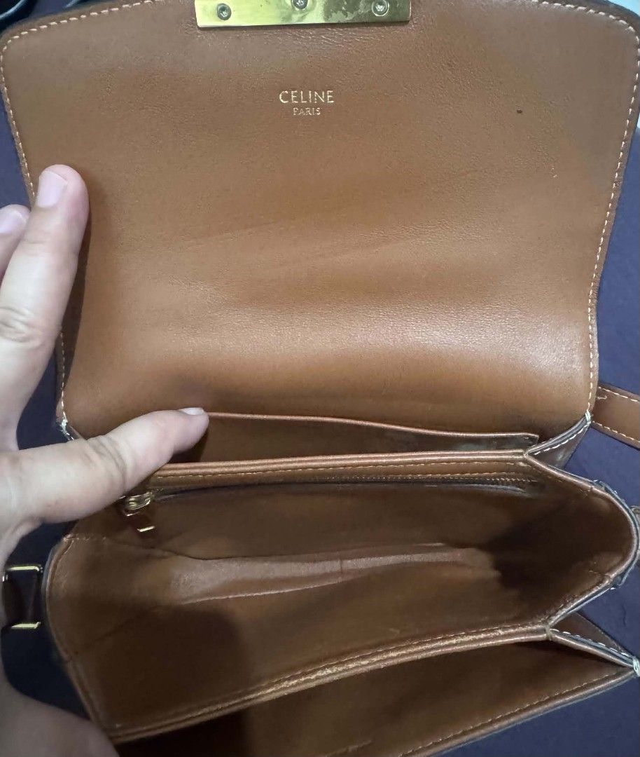 Celine Triomphe Canvas & Leather Crossbody Bag (Category: Luxury Bags & Wallets) located in Bacolod City. Submitted by asheroth77 (Listing ID 1457071707, Image 2). Description: Celine Triomphe crossbody bag - Classic canvas with brown leather trim - Elegant gold hardware closure - Multiple interior compartments for organization - Adjustable strap for comfortable wear - Ideal for everyday use.