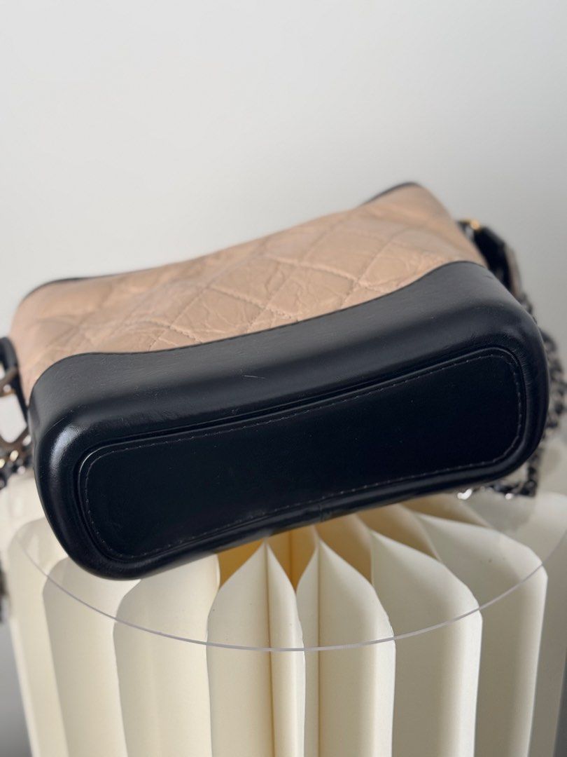 Chanel Small Gabrielle Hobo Bag (Category: Luxury Bags & Wallets) located in Las Pinas. Submitted by shopdeynuh (Listing ID 1457000190, Image 2). Description: Classic Black/Beige color combo In good condition, structure still intact with normal signs of use (some creasing, base scratches, leather rubs on strap) Comes with dustbag, authenticity card, copy receipt, bag organizer and entrupy certificate of authenticity.