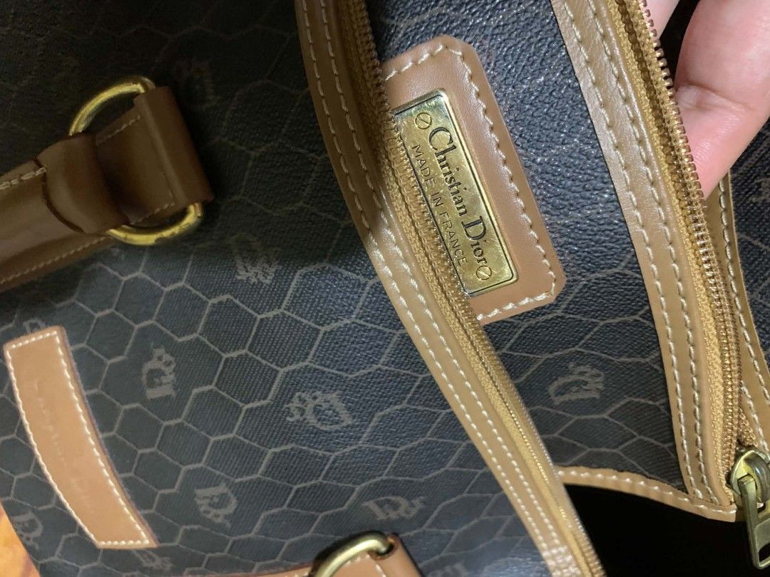 Christian Dior Monogram Boston Bag (Category: Luxury Bags & Wallets) located in Gapan. Submitted by cleverstar.36492b (Listing ID 1457059180, Image 3). Description: Vintage Christian Dior boston bag. Classic monogram print all over. Tan leather trim and handles. Gold hardware details. Zipper closure. Made in France. Great for travel or everyday use..