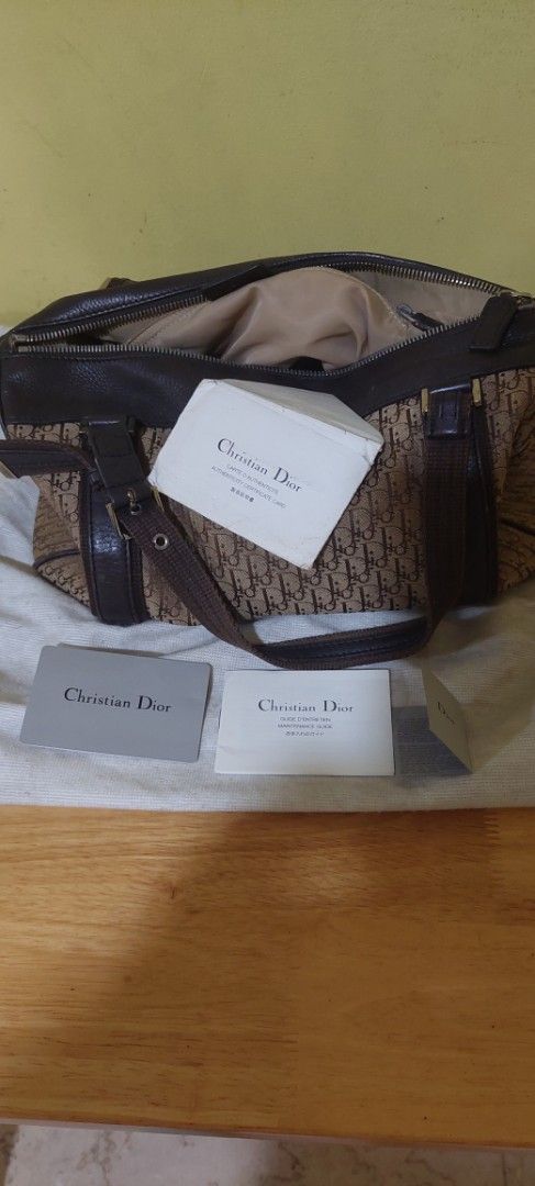 Christian Dior Monogram Canvas Leather Trim Shoulder Bag (Category: Luxury Bags & Wallets) located in Manila. Submitted by aabila (Listing ID 1457033090, Image 3). Description: - Authentic Christian Dior shoulder bag - Iconic Dior monogram canvas with brown leather trim - Interior zip pocket - Includes dust bag and authenticity cards - Ideal for everyday use.