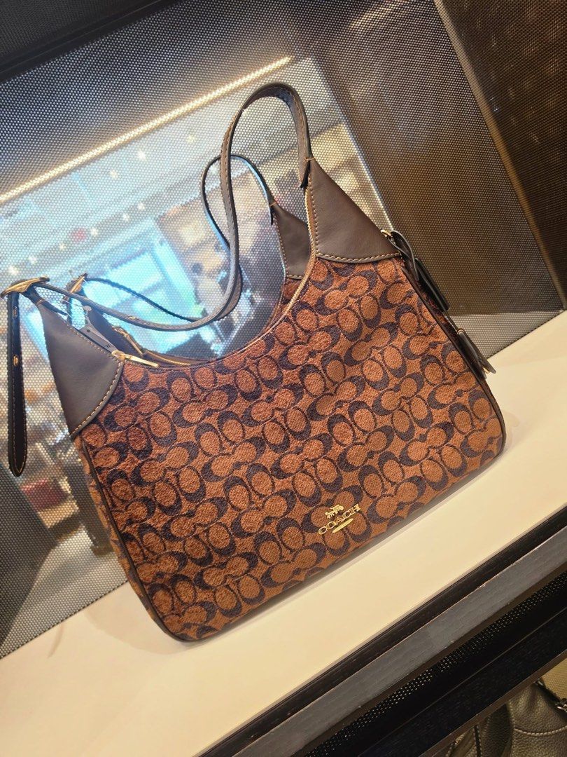 Coach Signature Hobo Shoulder Bag (Category: Luxury Bags & Wallets) located in Santa Rosa. Submitted by megally (Listing ID 1457078253, Image 2). Description: Coach Ella Signature Available in all colors Espresso,maroon,black and signature dark brown and light brown Some with gift receipt P16,900+ sf each Original .
