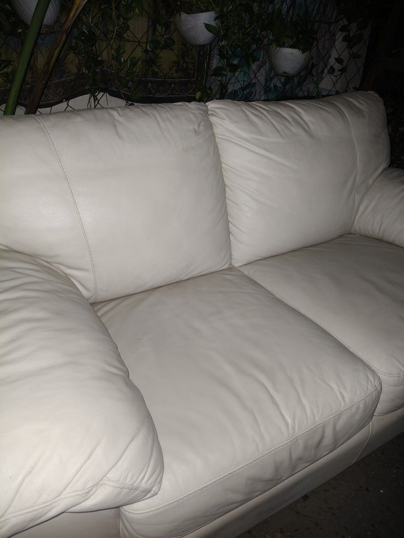Cream Leather 2-Seater Sofa IKEA (Category: Sofas) located in Makati City. Submitted by candyhinojales (Listing ID 1457012614, Image 2). Description: - Cream leather sofa - Comfortable seating for two - Dimensions: 65" W x 36" D x 32" H - Ideal for living rooms or apartments.