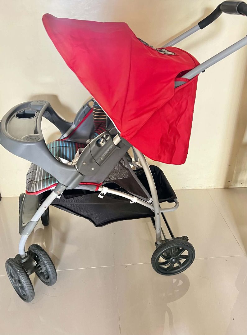 Declutter Sale: Used Graco Mirage Stroller (Category: Strollers) located in Imus. Submitted by vfamfinds (Listing ID 1456979156, Image 2). Description: Declutter Sale: Used Graco Mirage Stroller P2,500 plus shipping fee -Adjustable multi-position recline seat -Integrated child tray with cup holder -Foldable red sun canopy -Secure 5-point safety harness restraint NOTE: Signs of usage, faded coloring on pads.