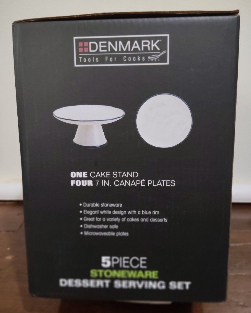 Denmark 5 Piece Stoneware Dessert Serving Set (Category: Dinnerware & Cutlery) located in Manila. Submitted by audrey03 (Listing ID 1457003570, Image 3). Description: - DENMARK Tools For Cooks 5-piece stoneware dessert serving set - Includes 1 cake stand and 4 x 7-inch canapé plates - Classic white design with a stylish blue rim - Made from durable stoneware - Dishwasher safe for easy cleaning - Microwaveable for reheating - Ideal for serving cak