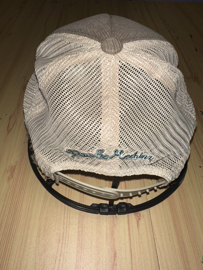 Deus Ex Machina Corduroy Trucker Cap (Category: Caps & Hats) located in Quezon City. Submitted by mancave_stuff (Listing ID 1456967342, Image 3). Description: - Brand: Deus Ex Machina - Style: Trucker Cap - Material: Brown Corduroy with Mesh Back - Features: Deus logo patch on front, embroidered text on back - Fit: Adjustable strap - Occasion: Casual wear .