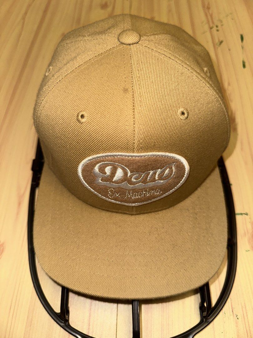 Deus Ex Machina Tan Snapback Cap (Category: Caps & Hats) located in Quezon City. Submitted by mancave_stuff (Listing ID 1456971600, Image 1). Description: - Deus Ex Machina snapback cap - Features classic Deus oval logo on the front - Script logo embroidered on the back - Adjustable snap closure for a custom fit - Ideal for everyday wear -used once only & displayed .