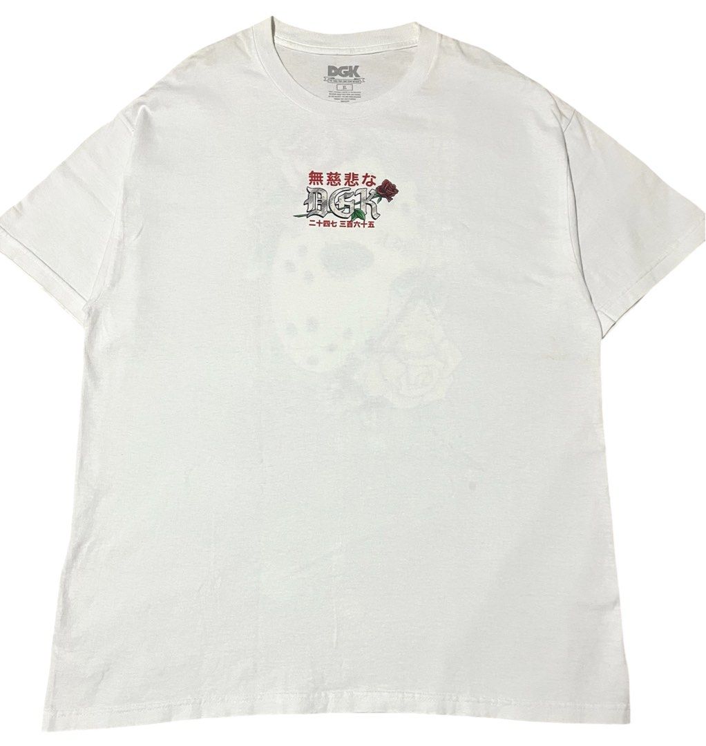 DGK "Premium Vision" (Ruthless) T-Shirt (Category: Tshirts & Polo Shirts ) located in Manila. Submitted by rhaldstsh.ph (Listing ID 1457109752, Image 1). Description: This white graphic tee features a horror-inspired aesthetic mixed with Japanese streetwear elements. Front Graphic: Features a minimal center-chest DGK logo woven through a red rose, accompanied by Japanese kanji text. Back Graphic: A large, detailed screen-print of a hockey mask (r