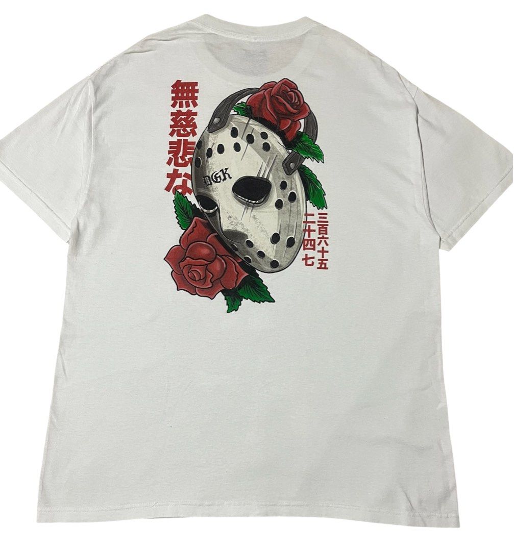 DGK "Premium Vision" (Ruthless) T-Shirt (Category: Tshirts & Polo Shirts ) located in Manila. Submitted by rhaldstsh.ph (Listing ID 1457109752, Image 2). Description: This white graphic tee features a horror-inspired aesthetic mixed with Japanese streetwear elements. Front Graphic: Features a minimal center-chest DGK logo woven through a red rose, accompanied by Japanese kanji text. Back Graphic: A large, detailed screen-print of a hockey mask (r