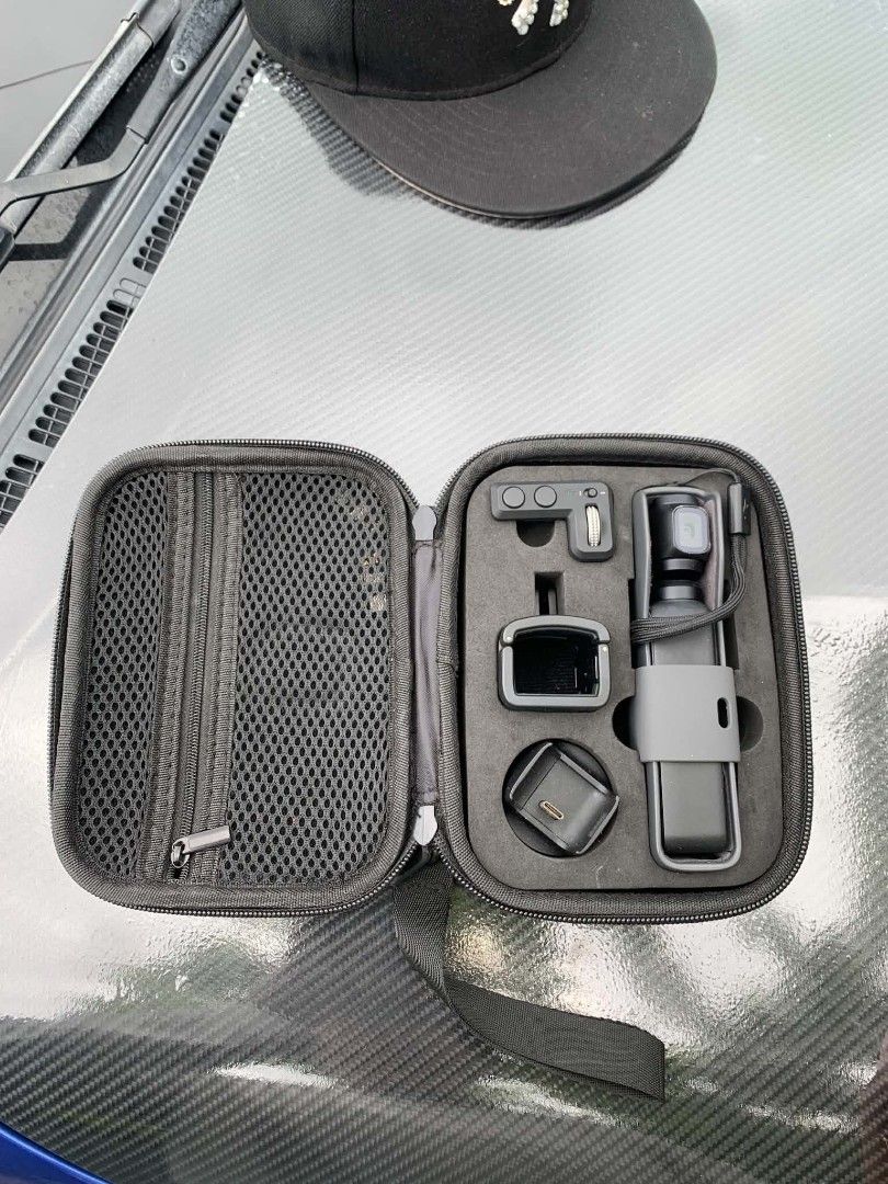 DJI OSMO POCKET 1 FIRST GEN (Category: Video Cameras) located in Manila. Submitted by asktodealyou (Listing ID 1457028329, Image 2). Description: FOR SALE 📥📥 Specifications: Sensor 1/2.3” CMOS Effective pixels: 12M Lens FOV: 80° F2.0 ISO Range Photo: 100-3200 Video: 100-3200 Electronic Shutter Speed 8s-1/8000s Max Image Size 4000×3000 pixels Still Photography Modes Single Shot, Panorama, Timelapse, Motionlapse Video Resolution 4K Ultra HD: 3840