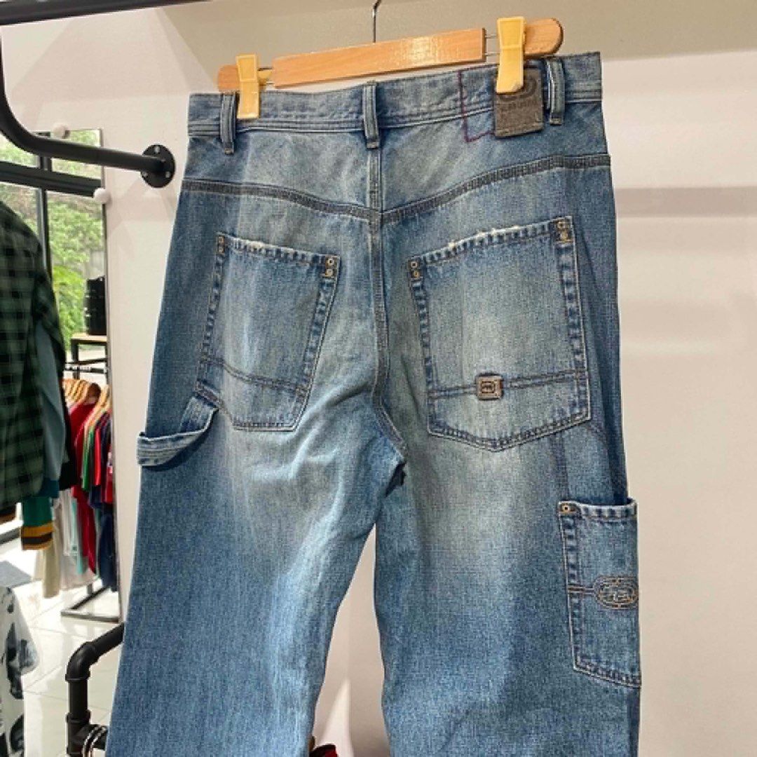 ECKO UNLTD. Baggy Carpenter Denim Jeans (Category: Jeans) located in Bambang. Submitted by heats777 (Listing ID 1457042991, Image 2). Description: - Classic blue denim jeans from ECKO UNLTD. - Baggy fit, perfect for a streetwear look. - Features multiple pockets and a utility loop. - Great for casual wear. - A staple piece for any wardrobe..