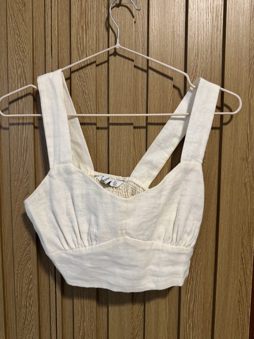 Editor’s Market White Linen Top (Category: Sleeveless) located in Paranaque City. Submitted by prelovedbye__ (Listing ID 1457083177, Image 1). Description: With slight discoloration .