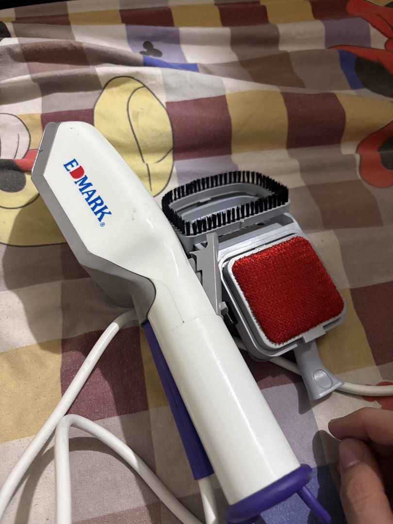 Edmark Garment Steamer with Brush Attachment (Category: Irons & Steamers) located in Manila. Submitted by chaigg (Listing ID 1457138840, Image 2). Description: - Edmark garment steamer - White and grey design - Comes with a brush attachment for stubborn fabrics - Power cord included - Ideal for quick clothing touch-ups.