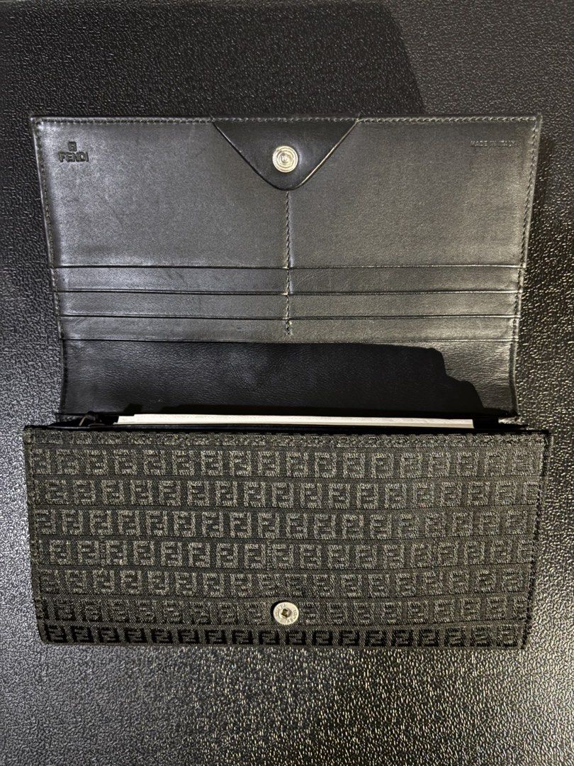 Fendi Zucca Pattern Wallet (Category: Luxury Bags & Wallets) located in Cavite. Submitted by axeliz (Listing ID 1457033791, Image 1). Description: - Iconic Fendi Zucca pattern - Genuine black leather interior - Multiple card slots for organization - Secure snap closure - Made in Italy - Ideal for everyday use.