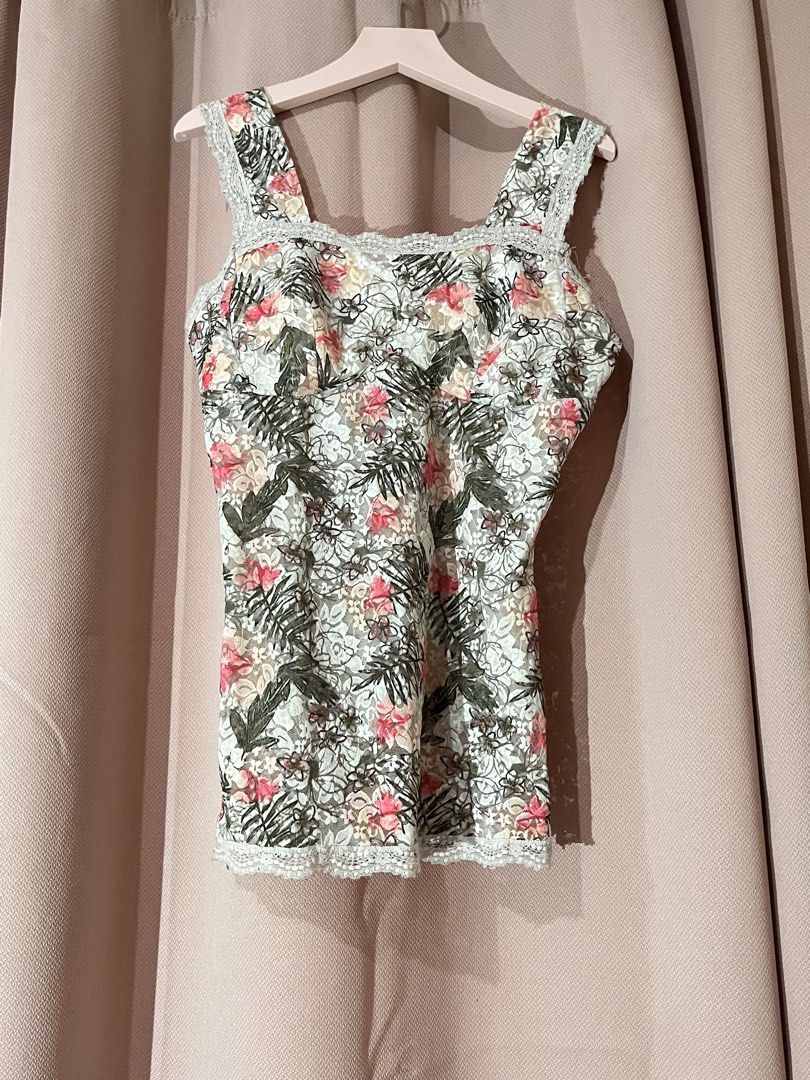 Floral Lace Trim Tank Top (Category: Sleeveless) located in Davao. Submitted by sonateine (Listing ID 1457058132, Image 1). Description: - Adorable floral print tank top - Features delicate lace trim on neckline and straps - Tropical leaf and pink flower design - Versatile for layering or standalone wear - Comfortable and stylish.