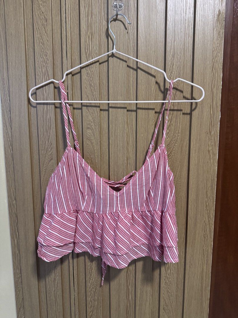 Forever 21 Striped Blouse (Category: Sleeveless) located in Paranaque City. Submitted by prelovedbye__ (Listing ID 1457085187, Image 1). Description: With adjustable straps.