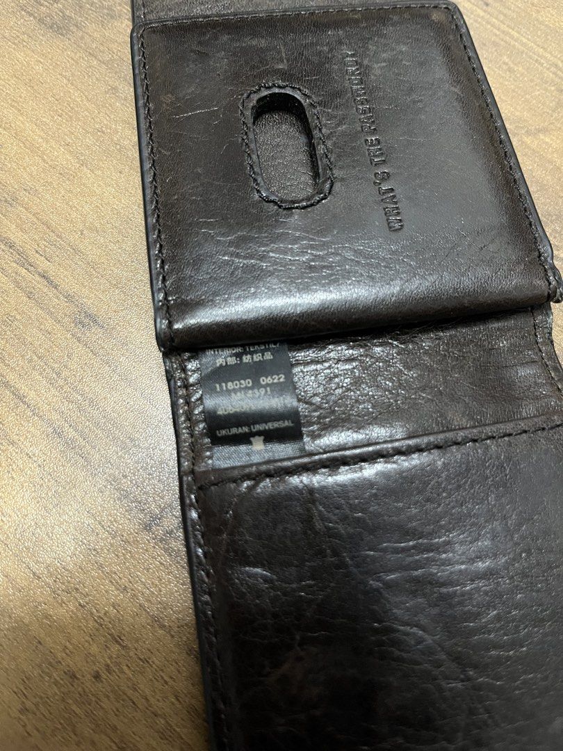 Fossil Leather Bifold Wallet with ID Window (Category: Luxury Bags & Wallets) located in Paranaque City. Submitted by rowell.nono (Listing ID 1457028272, Image 3). Description: - Fossil dark brown leather bifold wallet - Multiple card slots - Clear ID window - Interior tag with product details - Plenty of life left, classic and functional.