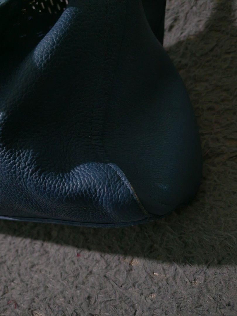 Furla Blue Leather Perforated Shoulder Bag (Category: Luxury Bags & Wallets) located in Las Pinas. Submitted by huslerz (Listing ID 1456991193, Image 3). Description: - Genuine blue leather Furla shoulder bag - Stylish perforated flap detail - Adjustable shoulder strap for comfort - Elegant gold-tone hardware - Minor scuffs on bottom corners, adding character - Ideal everyday bag for your essentials.