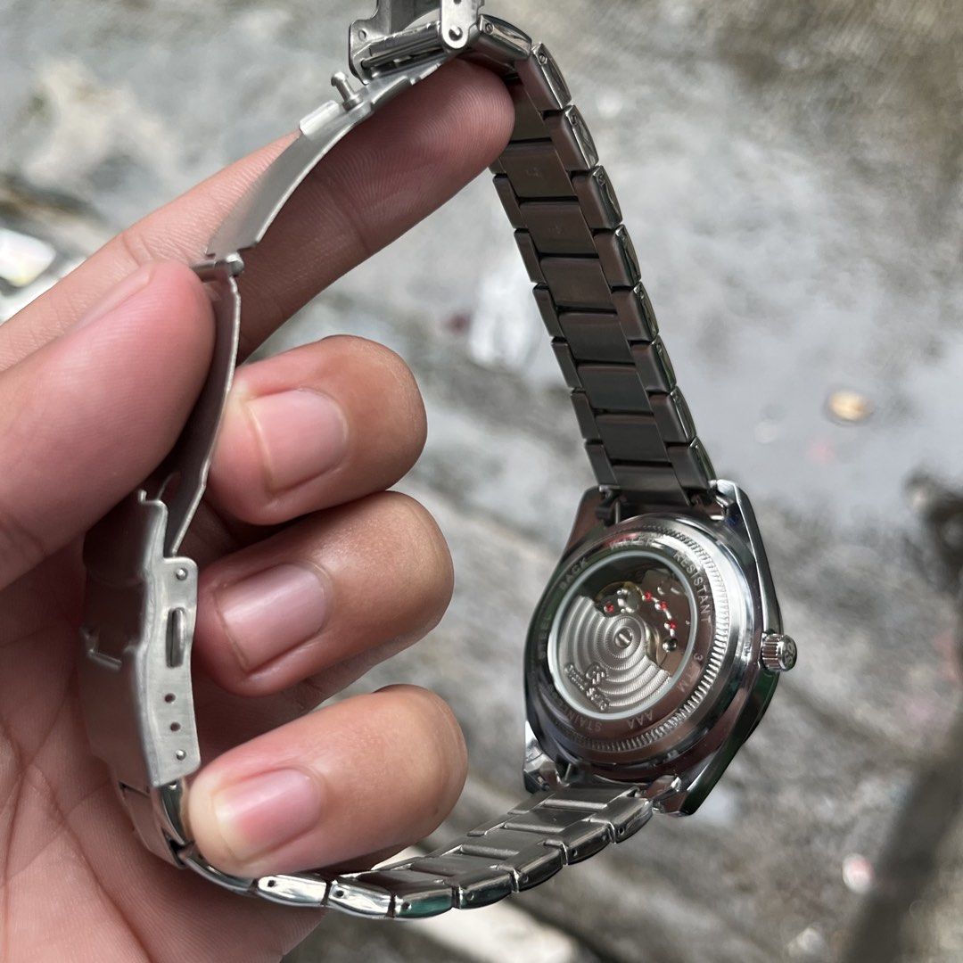 GRAND SEIKO (Category: Luxury Watches) located in Manila. Submitted by aihzenbalt91094 (Listing ID 1457086834, Image 3). Description: 40 MM WITH DATE AUTOMATIC OPEN BACK DOUBLE LOCK HEAVY WATER RESIST WORKING EXCELLENT NO ISSUE CLAIM 2,000 WITH BOX.