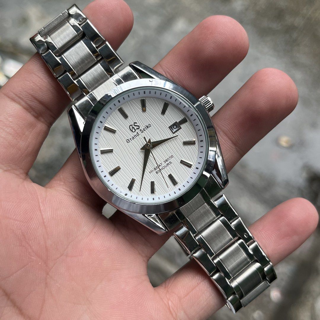 GRAND SEIKO (Category: Luxury Watches) located in Manila. Submitted by aihzenbalt91094 (Listing ID 1457086834, Image 1). Description: 40 MM WITH DATE AUTOMATIC OPEN BACK DOUBLE LOCK HEAVY WATER RESIST WORKING EXCELLENT NO ISSUE CLAIM 2,000 WITH BOX.