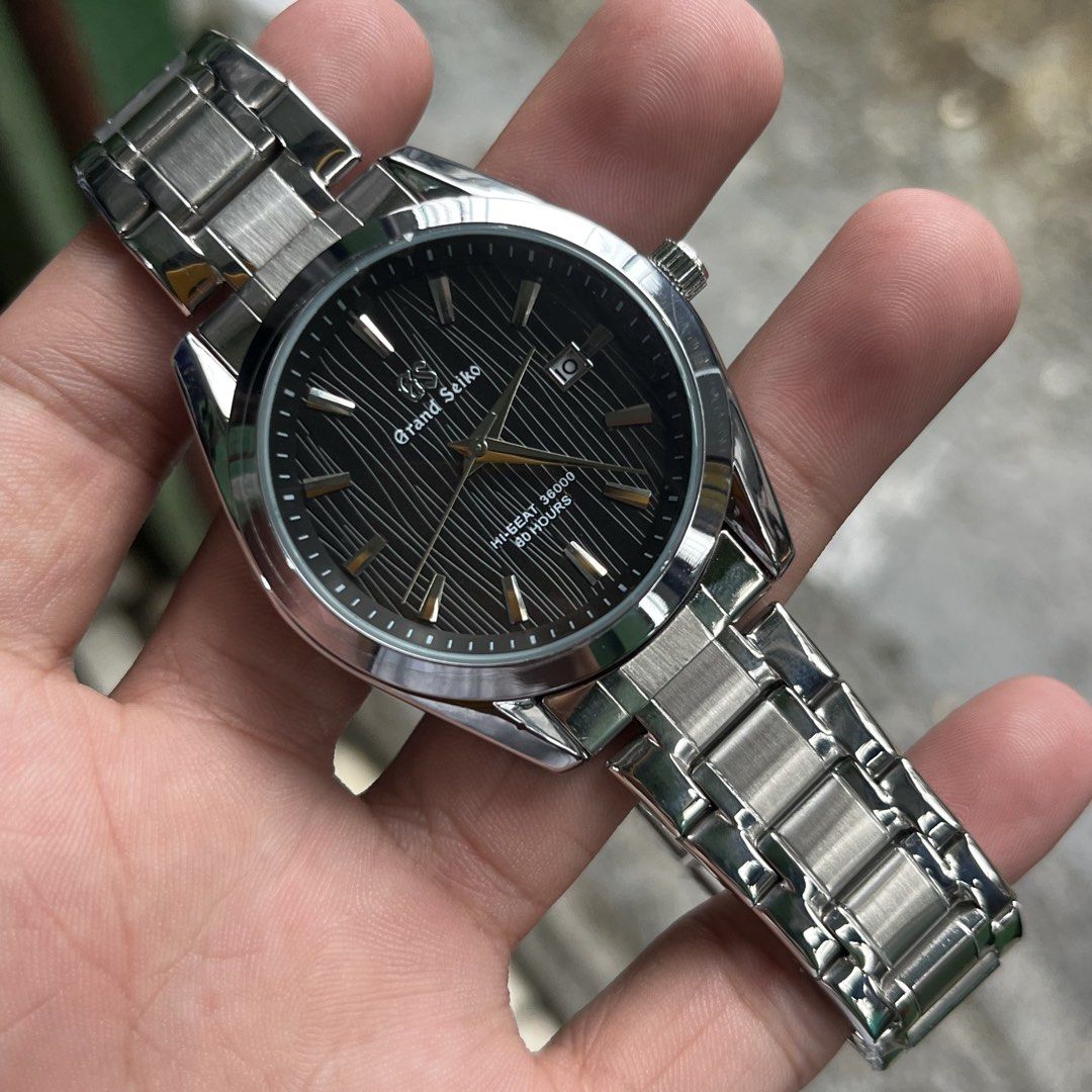 GRAND SEIKO BLACK DIAL (Category: Luxury Watches) located in Manila. Submitted by aihzenbalt91094 (Listing ID 1457084636, Image 1). Description: 40 MM WITH DATE AUTOMATIC OPEN BACK DOUBLE LOCK HEAVY WATER RESIST WORKING EXCELLENT NO ISSUE CLAIM 2,000 WITH BOX.