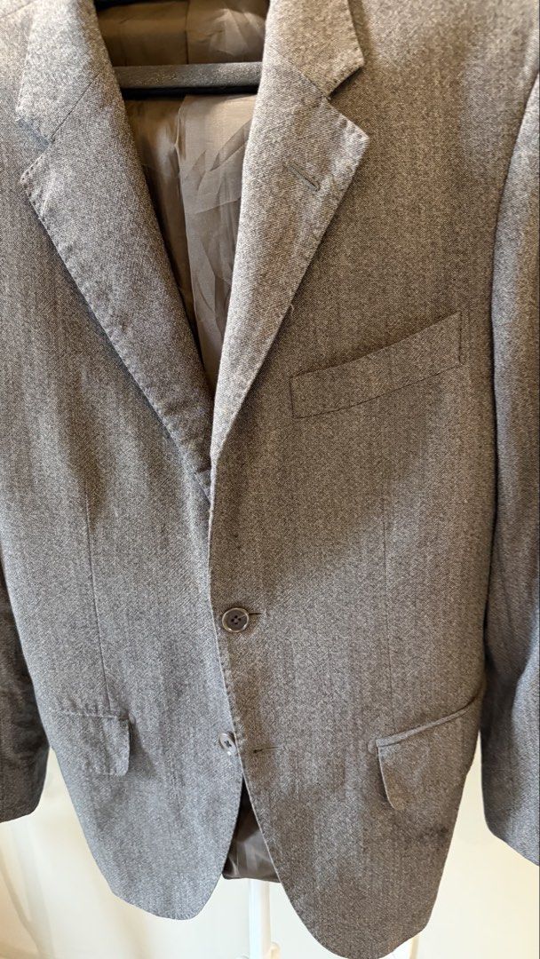 Grey Oversized Tailored Blazer (Category: Coats, Jackets and Outerwear) located in Caloocan City. Submitted by hellomaryon (Listing ID 1457003909, Image 3). Description: Classic and versatile grey blazer with a clean tailored silhouette. Easy to dress up or pair with trousers or a skirt for a polished look, or wear casually with jeans. ✨ Neutral grey colour ✨ Notched lapel collar ✨ Long sleeves ✨ 2-button front closure ✨ Front flap pockets ✨ Stru
