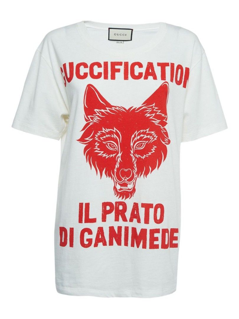 Gucci White Wolf Print T-Shirt (Category: Tshirts & Polo Shirts ) located in Manila. Submitted by icamalicdem29 (Listing ID 1457017629, Image 2). Description: - Authentic White Gucci T-Shirt - Size: S - Design: Red wolf graphic with 'GUCCIFICATION IL PRATO DI GANIMEDE' text - Origin: Made in Italy - Style: Bold statement piece.