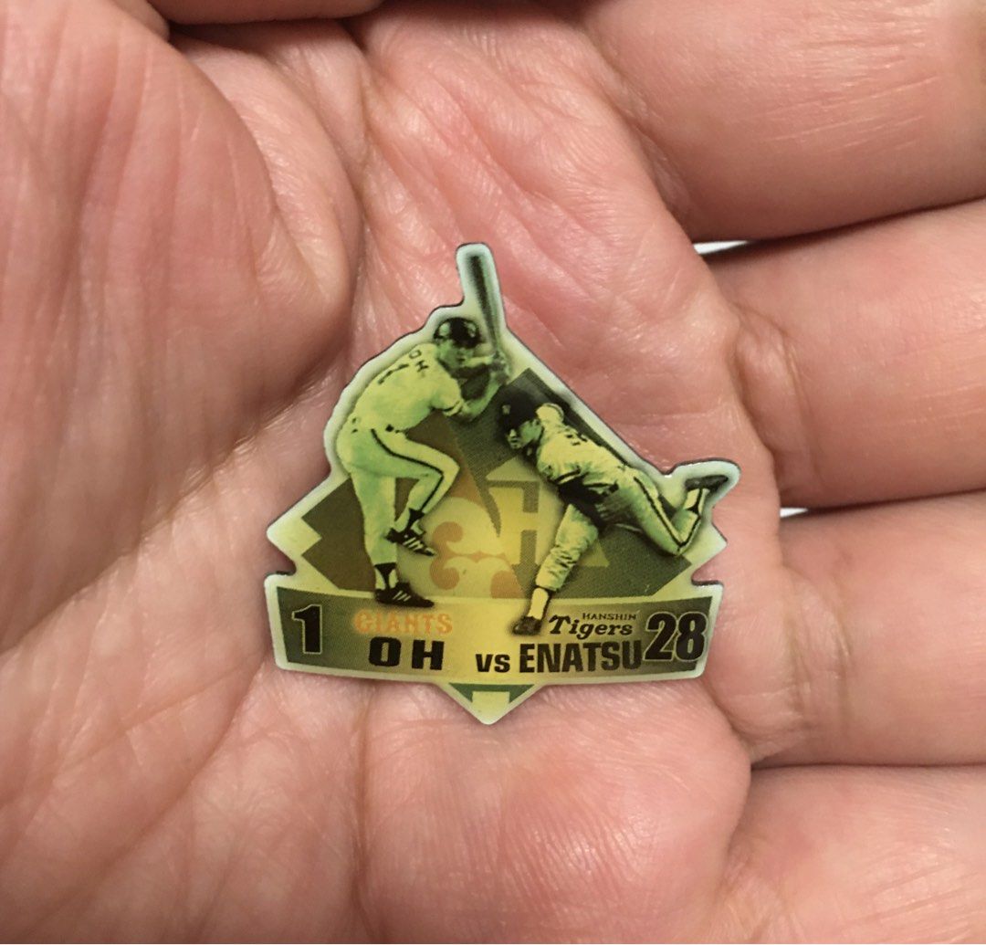 Hanshin Tigers vs Giants Baseball Player Pin (Category: Vintage Collectibles) located in Pasay City. Submitted by gilbertso62551 (Listing ID 1457060863, Image 1). Description: - Official Hanshin Tigers vs Giants baseball pin - Features player #28 Enatsu vs player #1 OH - "OFFICIAL" and "HANSHIN TIGERS" marked on the back - Perfect for baseball and Hanshin Tigers collectors! - As is,where is - Not BrandNew .