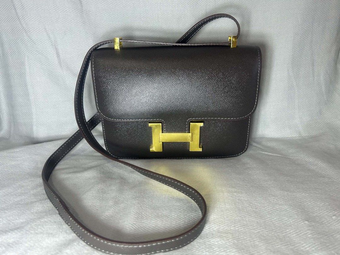 Hermes Constance in Dark Gray GHW (Category: Shoulder Bags) located in Manila. Submitted by prelovedrepubliq (Listing ID 1457126986, Image 1). Description: Pre-loved Japan Sourced Hermes Constance in Dark Gray with Gold Hardware Comes with dustbag Still good as new Authenticity cert not available. You may self-authenticate..