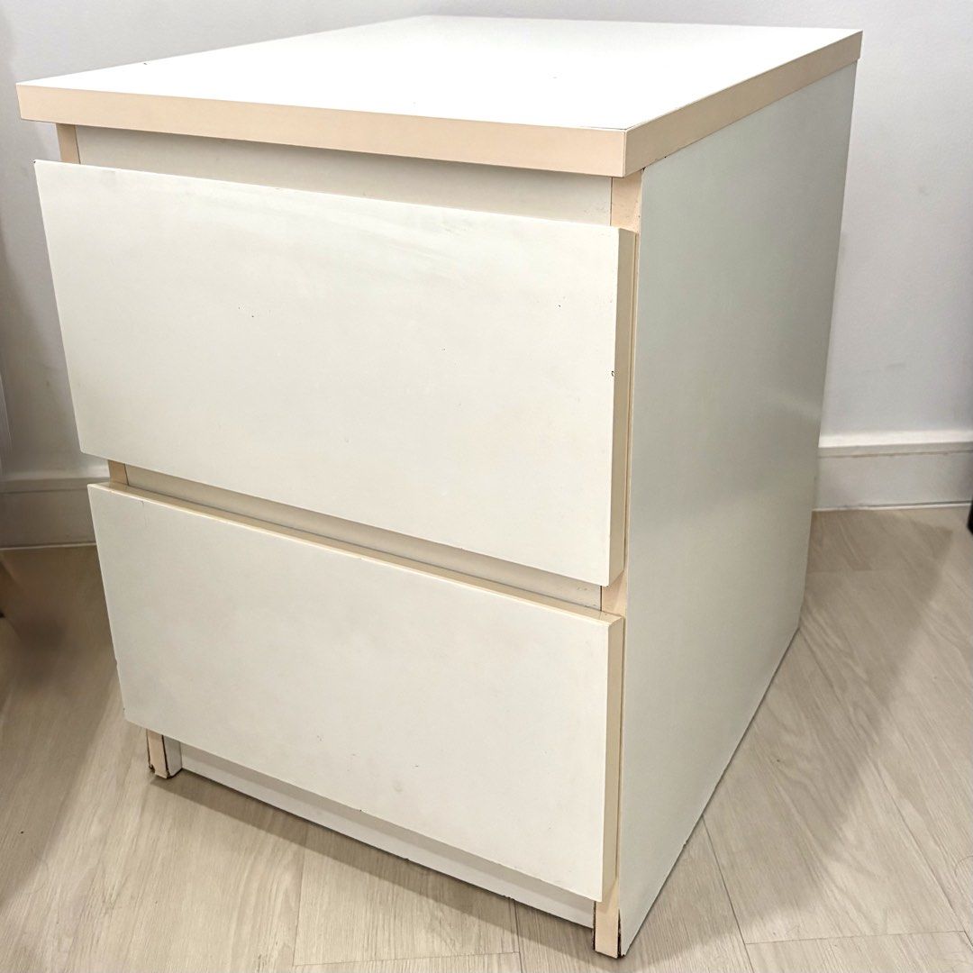 IKEA Malm 2-drawer Chest White (Category: Shelves, Cabinets & Racks) located in Paranaque City. Submitted by decluttering.diva (Listing ID 1456996074, Image 2). Description: IKEA Malm 2-drawer Chest White 40x55 cm (15 7/8x21 5/8 “) - slight discoloration and small paint chips from usage and sun exposure since it was used as side table near a window - can be repainted or applied with vinyl sticker - originally bought for Php3k at IKEA Ph - rfs: re