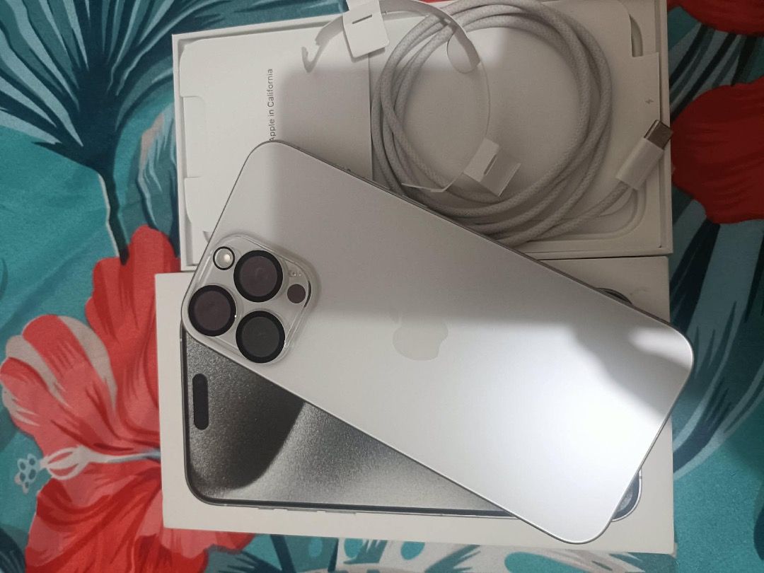 iPhone 15 pro max 512gb (Category: iPhone 15 Series) located in Caloocan City. Submitted by silentbear_c85875 (Listing ID 1456963703, Image 2). Description: No to lowballers please. Thank you Location: Market2 / SM Aura Personal use, not buy and sell. With box and unit only E-Sim - no restrictions / Factory Unlocked.