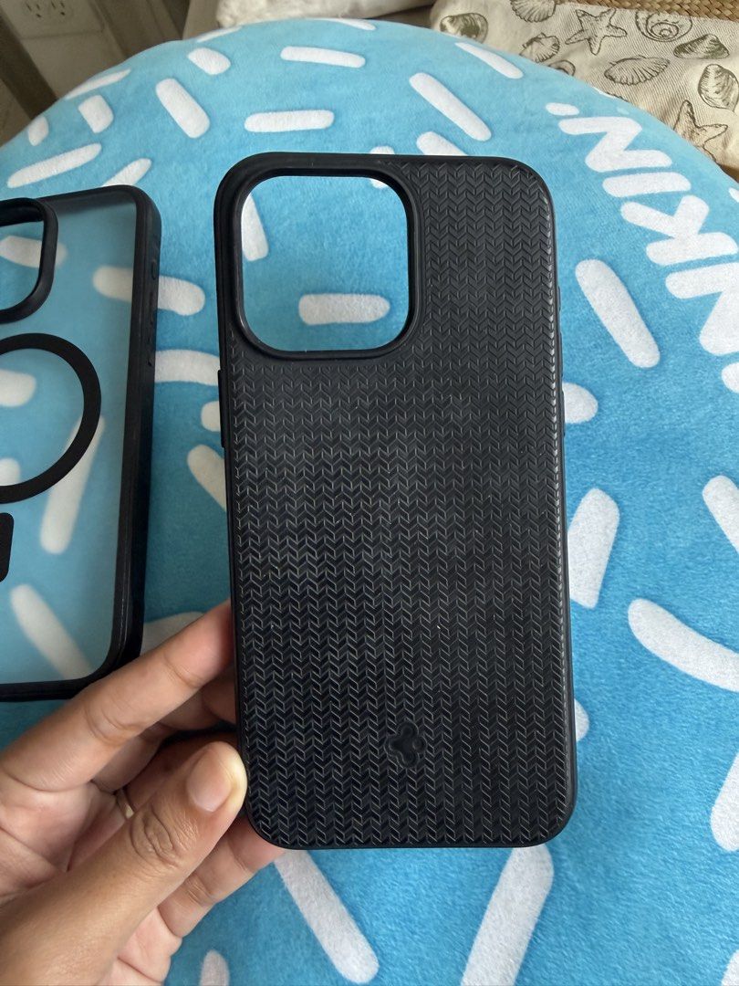 Iphone 15 pro max OG case (Category: Cases & Sleeves) located in Pasig City. Submitted by louisyana (Listing ID 1457023646, Image 2). Description: Like new Barely used Naalikabukan lang, original spigen Mandaluying area.