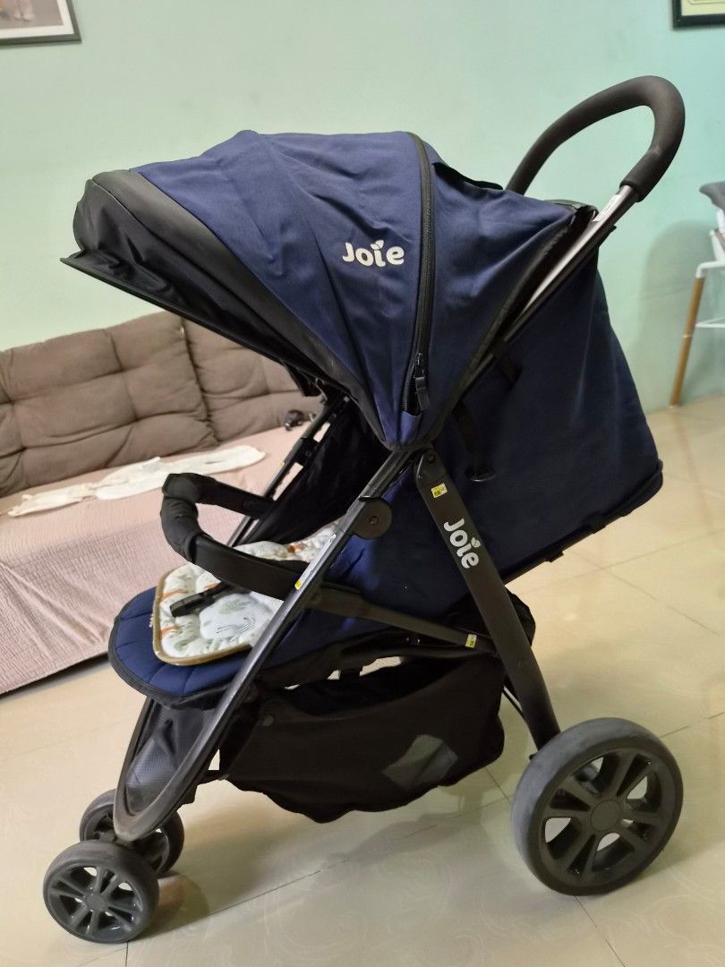 Joie Stroller Litetrax 3 Navy Blue with freebies (Category: Strollers) located in Quezon City. Submitted by santosimmah (Listing ID 1456972129, Image 2). Description: - Navy blue Joie stroller - Large, convenient storage basket underneath - Adjustable canopy for sun protection - Sturdy wheels designed for smooth rides - Easy to fold and carry for portability - Joie - 13k at Edamama Freebies: - two stroller pads - Yakap Ina baby carrier - stroller