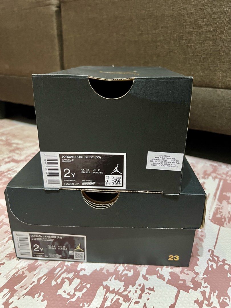 Jordan 11 Retro (PS) & Jordan Post Slide (GS) Size 2Y Bundle (Category: Babies & Kids Fashion) located in Quezon City. Submitted by prettydollph (Listing ID 1457073919, Image 2). Description: - Jordan 11 Retro (Preschool) - Size 2Y - Jordan Post Slide (Grade School) - Size 2Y - Jordan 11s: Black and White colorway - Jordan Slides: Black colorway - Both come with original boxes - Ideal for young Jordan fans.
