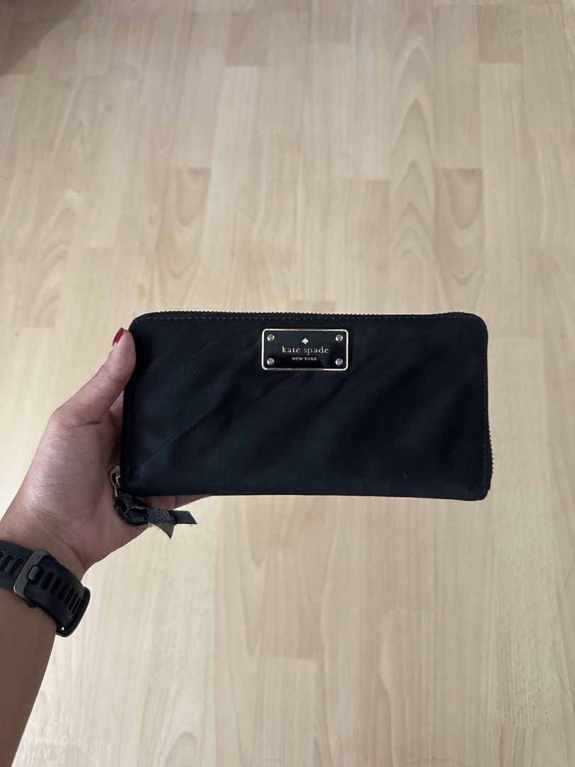 Kate Spade Black Nylon Zip Wallet (Category: Wallets & Card holders) located in Quezon City. Submitted by tangled8 (Listing ID 1456998720, Image 1). Description: .