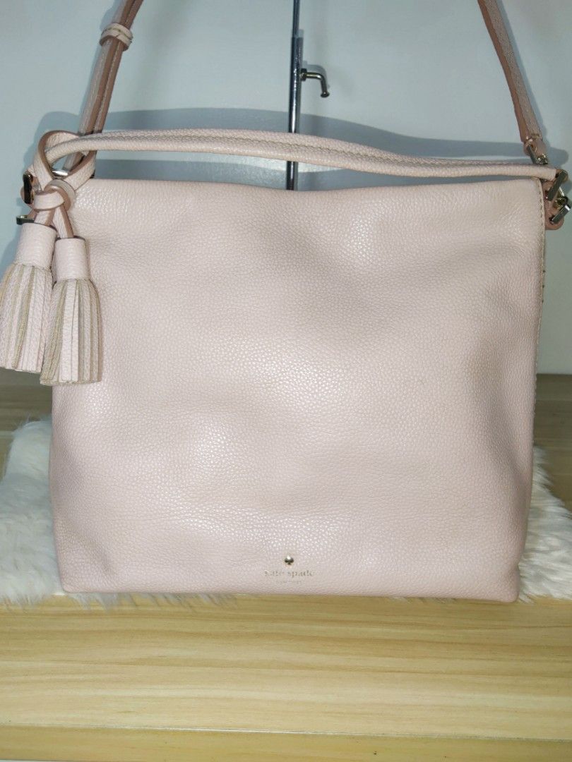 Kate Spade in Blush Pink 2 way Bag (Category: Luxury Bags & Wallets) located in Quezon City. Submitted by nurturenest1018 (Listing ID 1453878691, Image 1). Description: location - Diliman, QC color - blush pink ***with straps in great condition Elegant, classic bag for work or weekend runs. The leather of the bag is still in great condition. Logo is discreet; a small lovely, elegant gold stamp..
