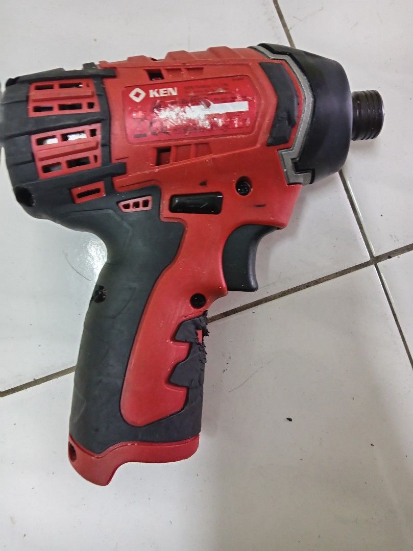 KEN Impact Driver Model (BL6412D) (Category: Home Improvement Tools & Accessories) located in Kuala Lumpur. Submitted by saisaikaya32154 (Listing ID 1456985607, Image 2). Description: - KEN Impact Driver - Colour: Red and Black - Condition: Works well, with some scuffs and wear on the handle grip. - Ideal for: DIY projects or professional use -Condition 9/10 -No battery and Charger -Area ampang -Meet up LRT cahaya station Gate A -Nett price No ne