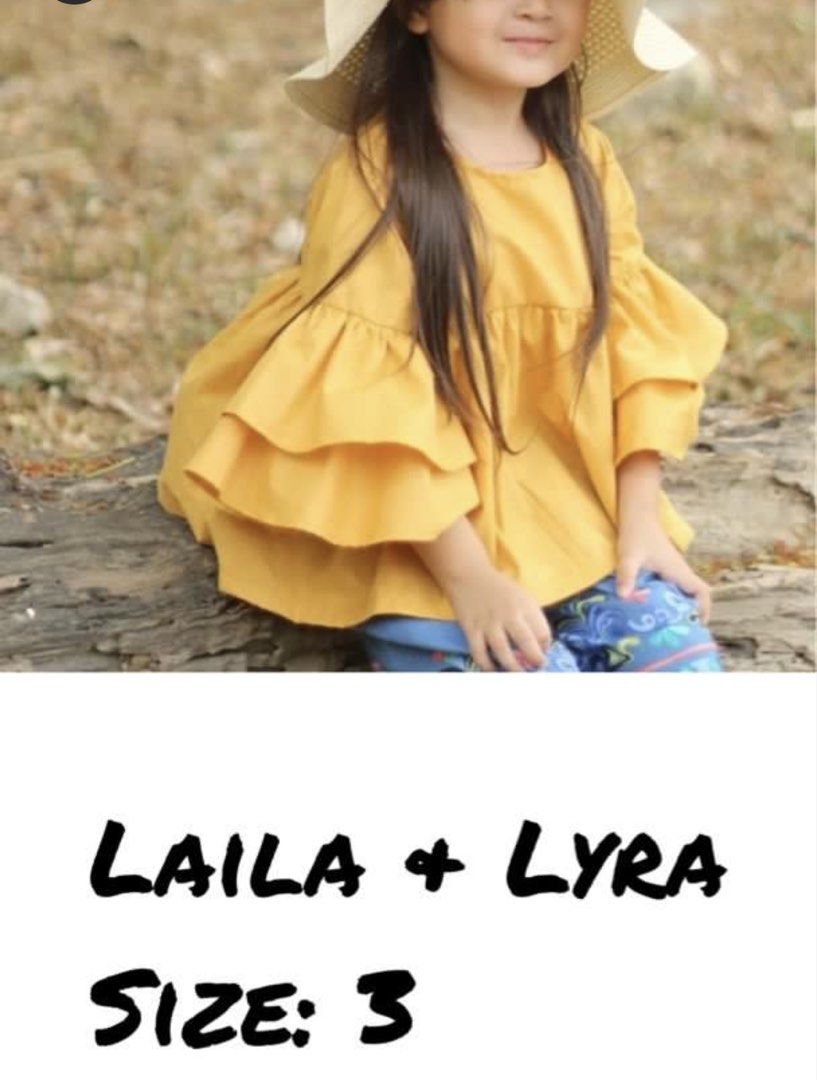 Laila + Lyra Kids Top Size 3 (Category: Babies & Kids Fashion) located in Makati City. Submitted by team_maxvin (Listing ID 1456985815, Image 1). Description: - Adorable yellow top - Features tiered ruffle sleeves - Size: 3 - Brand: Laila + Lyra.