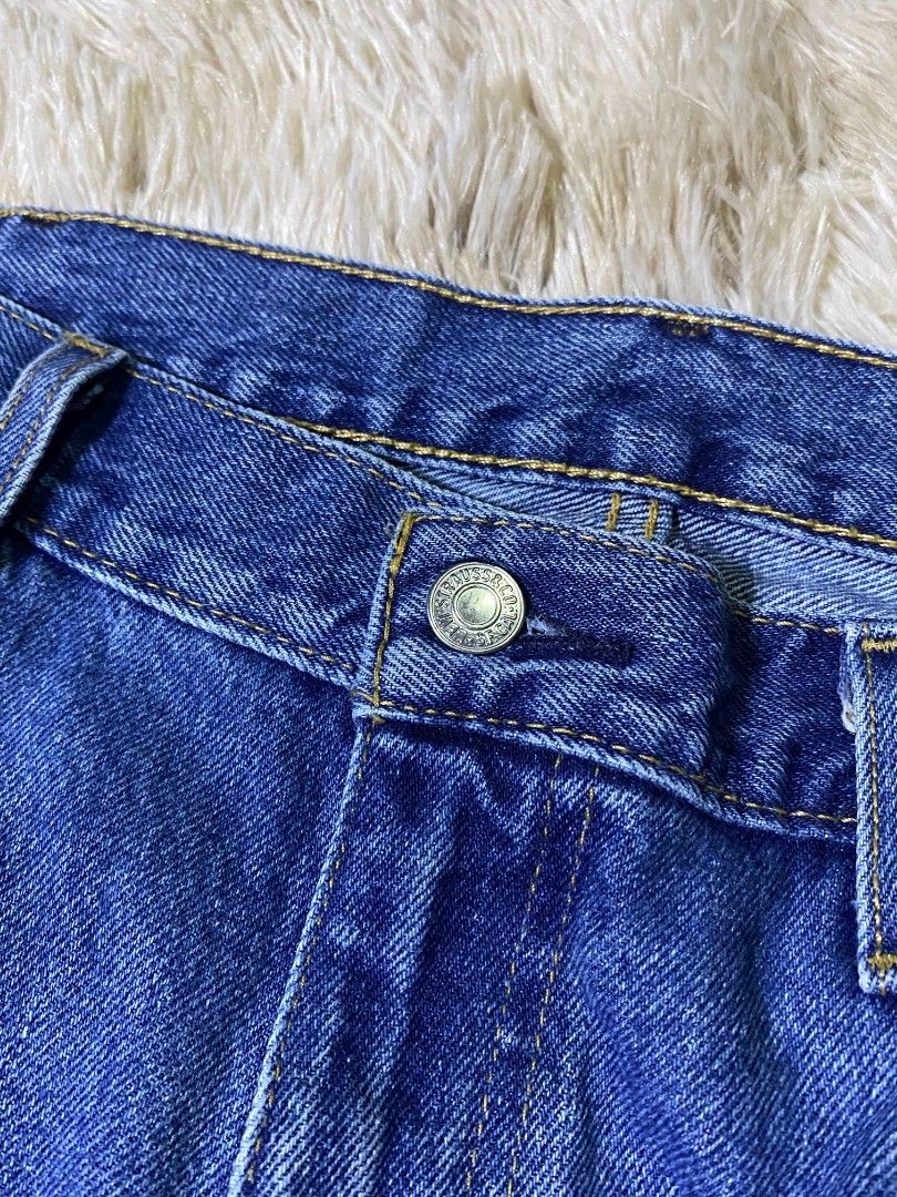 Levi's 505 Regular Fit Blue Denim Jeans (Category: Jeans) located in San Fernando. Submitted by cris.lloyd34 (Listing ID 1457085626, Image 2). Description: - Classic Levi's 505 jeans - Regular fit, straight leg - Medium blue wash denim - Button fly closure - Signature arcuate stitching on back pockets - Perfect for everyday wear.