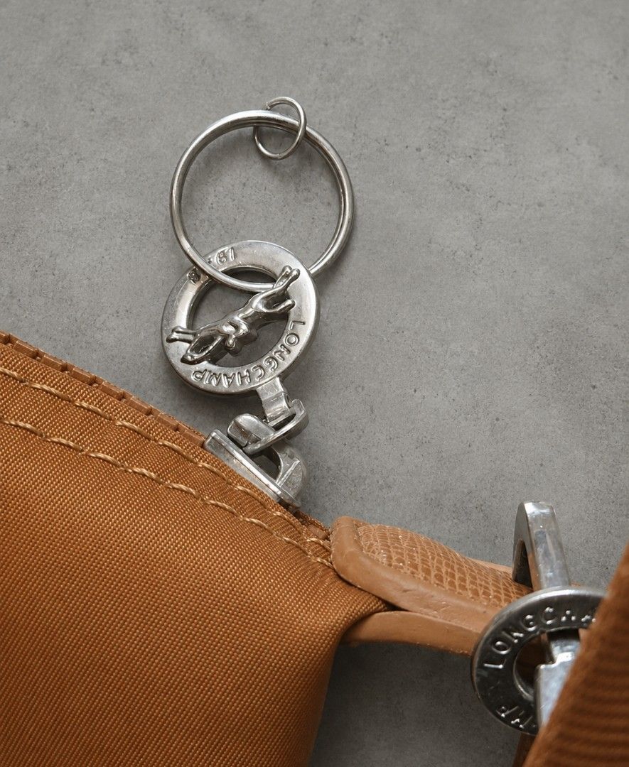 Longchamp Le Pliage Neo Top Handle Bag (Category: Luxury Bags & Wallets) located in Rizal. Submitted by stoo_cee (Listing ID 1456962852, Image 2). Description: Longchamp tote 14 x 11 inches Issue: See pics 850+sf .