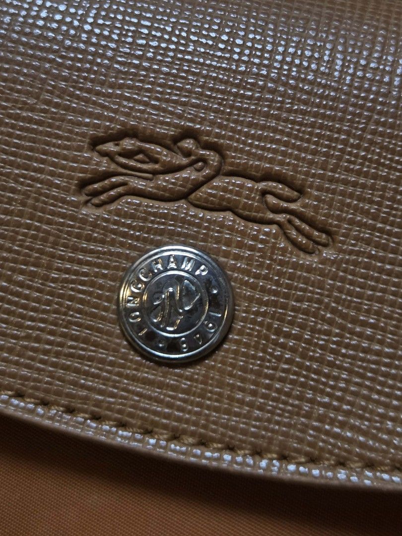 Longchamp Le Pliage Neo Top Handle Bag (Category: Luxury Bags & Wallets) located in Rizal. Submitted by stoo_cee (Listing ID 1456962852, Image 3). Description: Longchamp tote 14 x 11 inches Issue: See pics 850+sf .