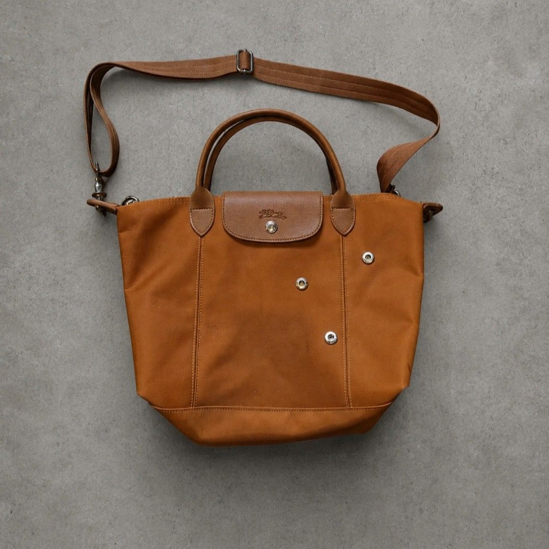 Longchamp Le Pliage Neo Top Handle Bag (Category: Luxury Bags & Wallets) located in Rizal. Submitted by stoo_cee (Listing ID 1456962852, Image 1). Description: Longchamp tote 14 x 11 inches Issue: See pics 850+sf .