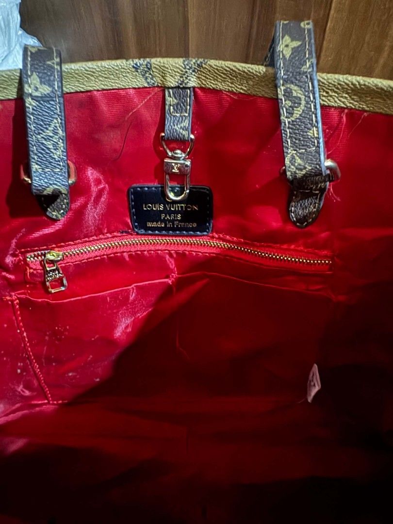 Louis Vuitton Monogram Tote Bag (Category: Luxury Bags & Wallets) located in Bacolod City. Submitted by asheroth77 (Listing ID 1457072461, Image 3). Description: - not guaranteed authentic Classic Louis Vuitton tote bag - Iconic monogram print - Red interior lining - Made in France - Spacious interior for essentials - Ideal for everyday use or travel - Timeless and versatile piece.