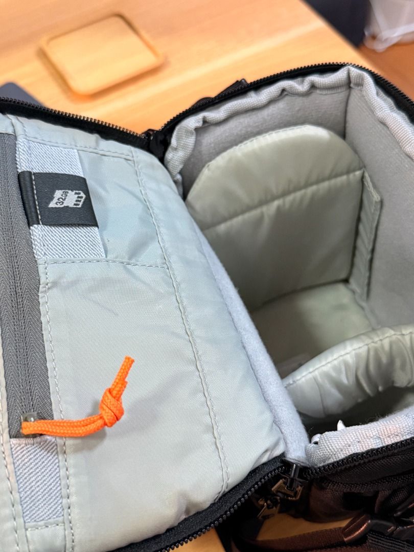 Lowepro Camera Bag (Category: Camera Bags & Carriers) located in Taguig. Submitted by bravecloud_beb7a5 (Listing ID 1457079629, Image 3). Description: Product Details: Brand: Lowepro (Authentic) Model: Adventura SH 120 II Color: Black Capacity: Fits a compact DSLR with kit lens, small accessories, and personal items Features: Durable molded base to protect gear from moisture and impact, padded main compartment, adjustable/removable shoulder strap