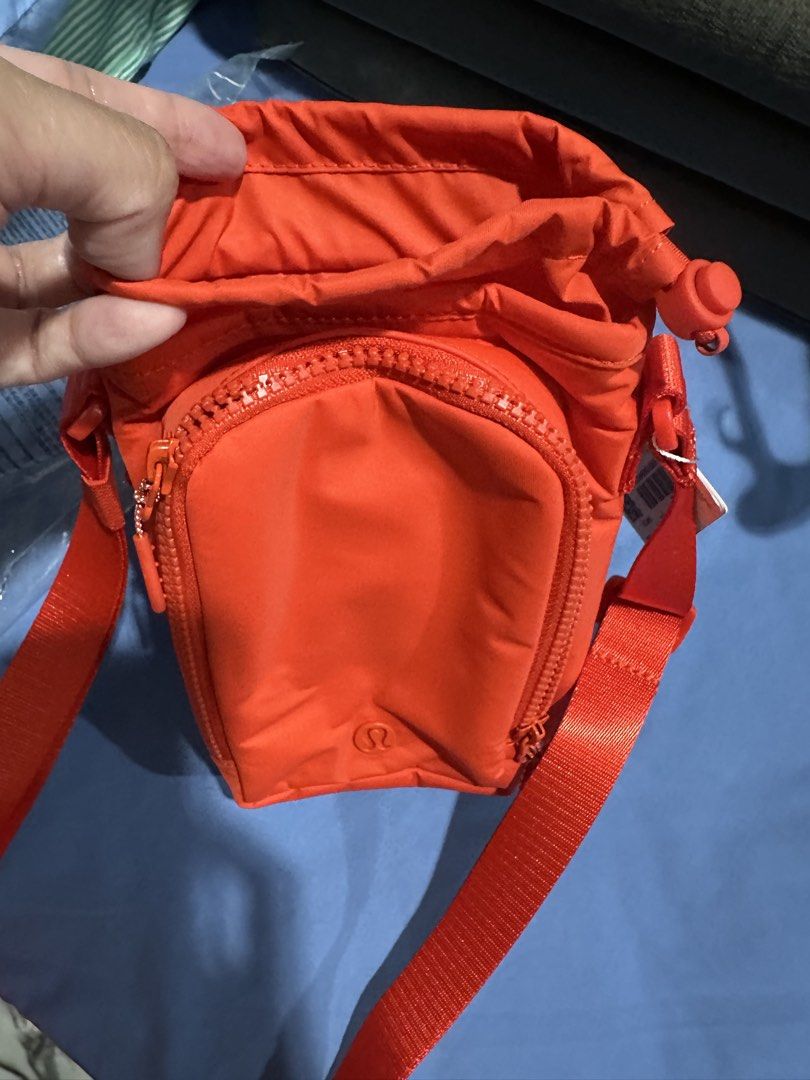 Lululemon Water Bottle Crossbody with Front Pocket (Category: Cross-body Bags) located in Paranaque City. Submitted by violetpenny (Listing ID 1457095381, Image 2). Description: Bought in US Brand new Extra.