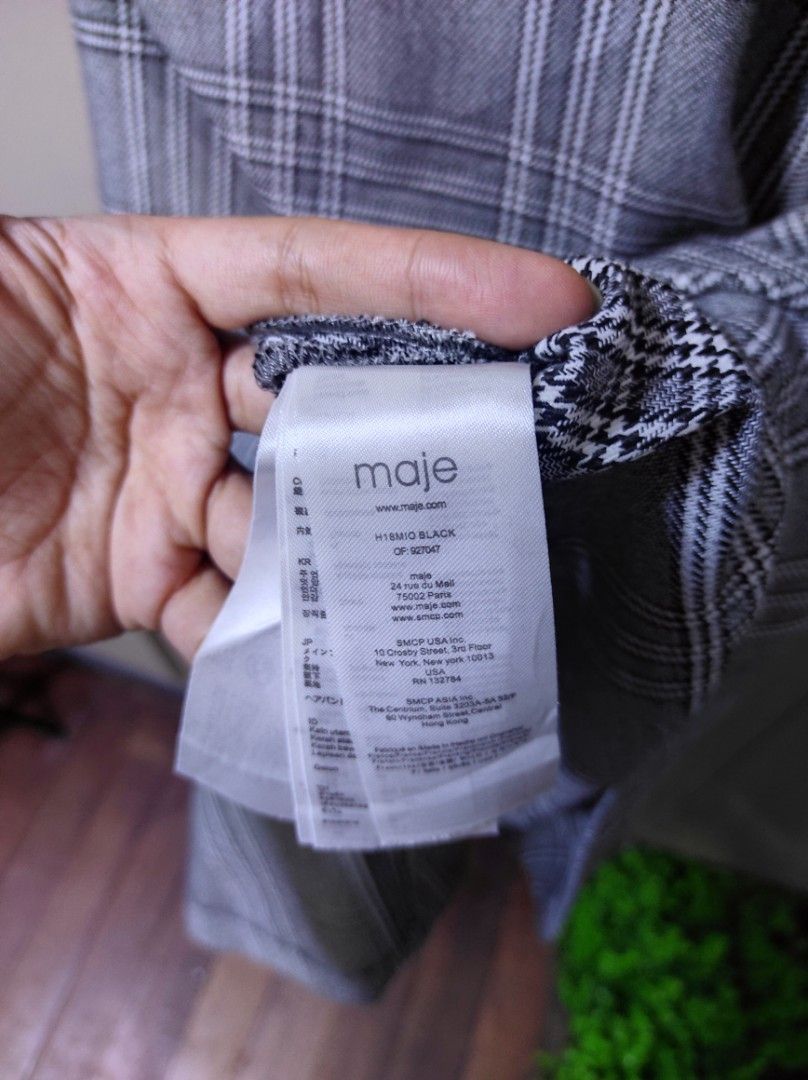 Maje Black Plaid Pinafore Dress (Category: Dresses) located in San Fernando. Submitted by lrrndc (Listing ID 1457076416, Image 3). Description: - Brand: Maje - Pinafore Dress / Jumper Dress can fit up to semi medium - Black and grey plaid pattern - Classic houndstooth trim on straps - Ideal for a smart casual outfit - Versatile for layering with tops.