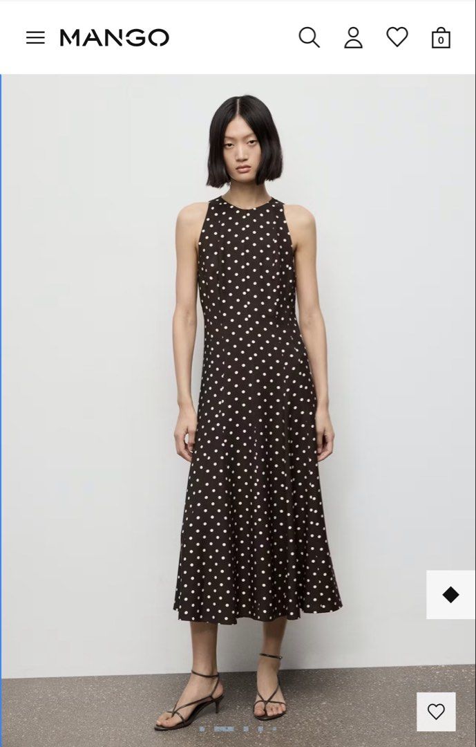 Mango Polka Dot Sleeveless Midi Dress (Category: Dresses) located in Carmona. Submitted by sclosetcleanup (Listing ID 1457027758, Image 1). Description: - Dark brown midi dress - White polka dot pattern - Sleeveless design - Halter neck style - Flattering A-line cut - Comfortable fabric - Perfect for casual or dressed-up occasions.