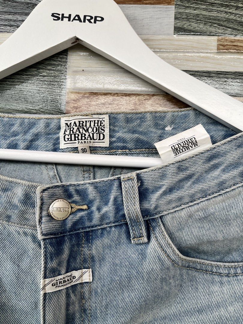 Marithe Francois Girbaud Light Wash Wide Leg Jeans Size 30 (Category: Jeans) located in Molave. Submitted by find_danz (Listing ID 1457090727, Image 3). Description: - Marithe Francois Girbaud wide leg jeans - Light wash denim - Size 30 - Classic five-pocket styling - Button and zip fly closure - Leather brand patch at back waistband - Perfect for everyday wear.