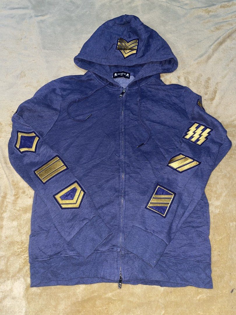 Mastermind Japan Zip-Up Hoodie with Gold Emblems (Category: Hoodies) located in Manila. Submitted by jabjabthriftplace (Listing ID 1457077263, Image 1). Description: - Mastermind Japan purple zip-up hoodie - 100% Cotton - Gold chevron and stripe emblems on hood, sleeves, and chest - Zipper closure with iconic skull pull tab - Perfect addition to any collection.