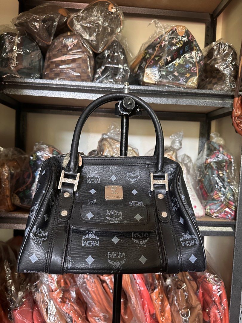 MCM Vicetos Black Boston Bag (Category: Luxury Bags & Wallets) located in Butuan. Submitted by slownsteady_ (Listing ID 1457036679, Image 1). Description: MCM Visetos Boston Bag No flaws, only signs of usage Can be used for work or for formal Occassions.