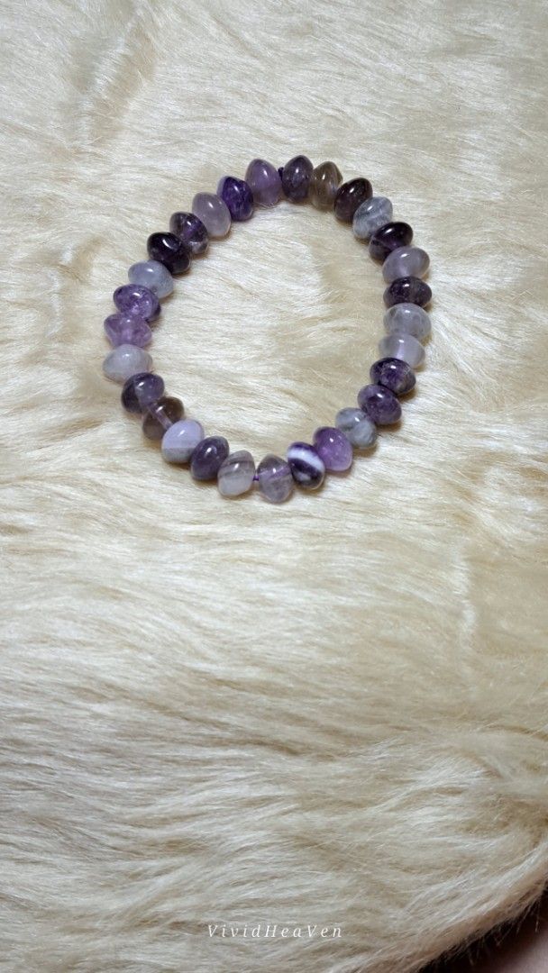 Natural Phantom Amethyst Crystal Bracelets - Healing Stones (Category: Bracelets) located in Quezon City. Submitted by crystallinehaven (Listing ID 1456955302, Image 3). Description: Natural Phantom Amethyst Crystal Bracelets - Healing Stones ♦️2 pcs available ♦️disc style beads p450 ♦️oval type beads p180 💥take all p550 PHANTOM AMETHYST with a mix of purple amethyst, milky/clear quartz and darker smoky-looking inclusions. Some beads show “ghost